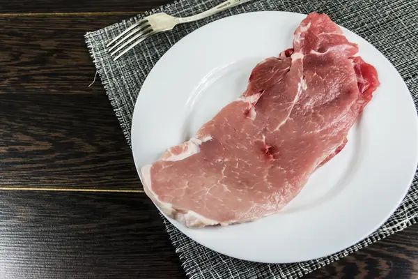 Οι πρώτες μπριζόλα χοιρινού κρέατος — Φωτογραφία Αρχείου