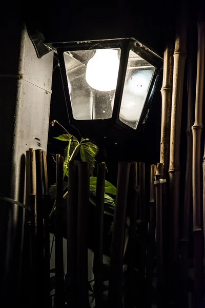 Old lantern background bamboo fence — Stock Photo, Image