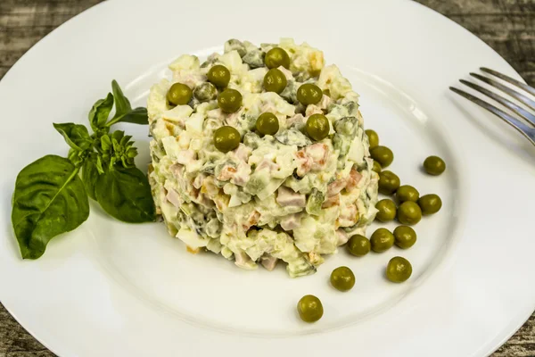 Salad of boiled vegetables, sausage and mayonnaise — Stock Photo, Image