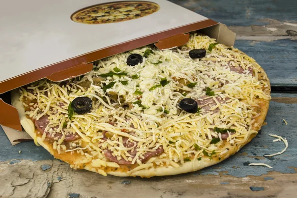 frozen pizza in a box