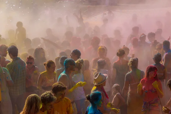 A large number of people in the colorful outdoor festival — Stock Photo, Image