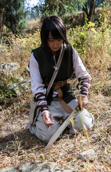 Woman in a historical costume in nature — Stock Photo, Image