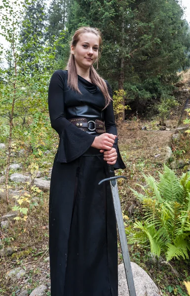 Woman in a historical costume in nature — Stock Photo, Image