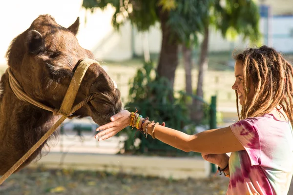 Tourists children riding camel — Stock Photo, Image