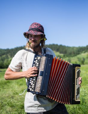 Russian man with accordion,redneck.