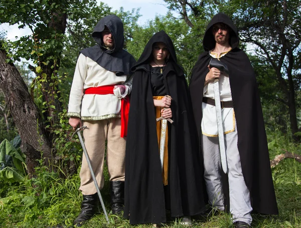 Three knights in armor is fighting  at forest — Stock Photo, Image