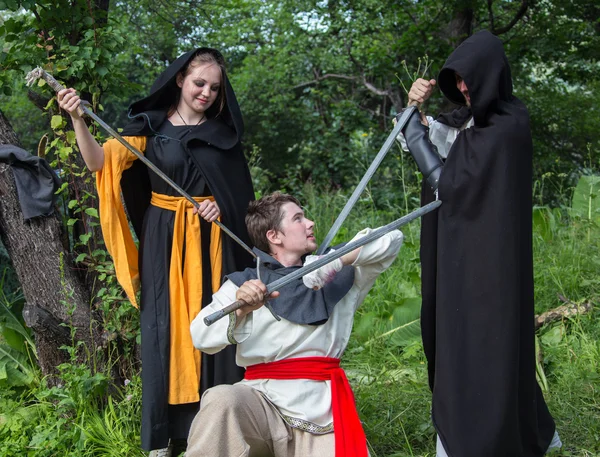 Three knights in armor is fighting  at forest — Stock Photo, Image