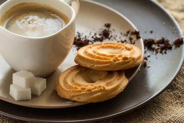 Cup of hot espresso coffee, and cookie — Stock Photo, Image