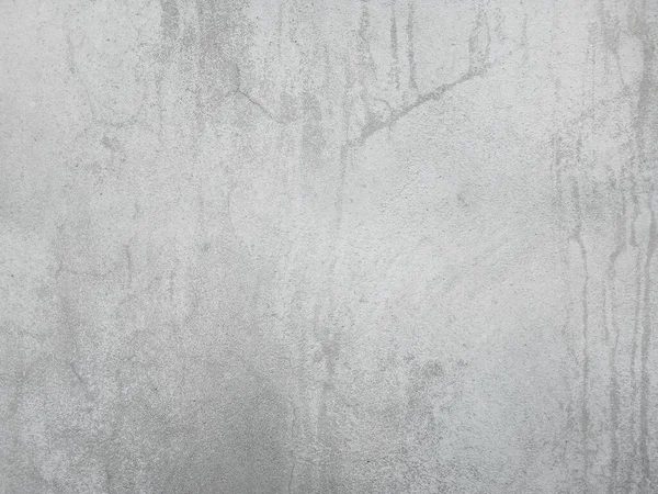 Soyut desenlere sahip beton duvarlar. Grafik tasarımı veya eski duvar kağıdı için klasik tarzda eski çimento dokusu.