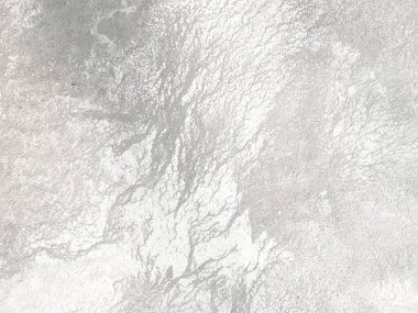 Soyut desenlere sahip beton duvarlar. Grafik tasarımı veya eski duvar kağıdı için klasik tarzda eski çimento dokusu.