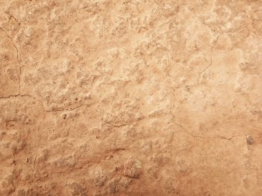 Zemin, kuraklık ve ölüm kavramına sahip arka plan veya grafik tasarımı için üst görünümde çatlaklar var..