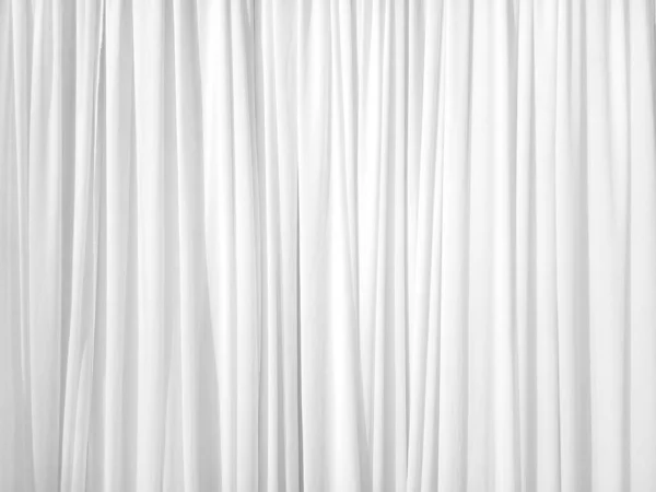 Soft white curtains are simple yet elegant for graphic design or wallpaper. Blurred cloth pattern with luxurious texture. Beautiful abstract background with smooth waves in a vintage style.