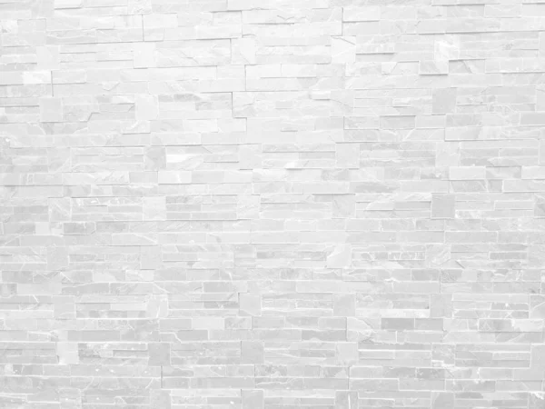 stock image Rough white stone wall background in vintage style for graphic design or wallpaper. Pattern of soft nature floor in retro concept. Gray abstract texture detail in construction or exterior decoration.