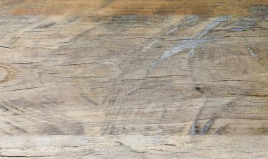 Grafik tasarımı veya duvar kağıdı için klasik tarzda güzel bir dokusu olan eski ahşap bir arka plan. Tablonun üst görünümünün soyut modelini kapat. İç dekorasyon için yüzeylerin ayrıntıları.