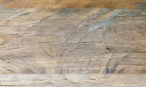 Grafik tasarımı veya duvar kağıdı için klasik tarzda güzel bir dokusu olan eski ahşap bir arka plan. Tablonun üst görünümünün soyut modelini kapat. İç dekorasyon için yüzeylerin ayrıntıları.