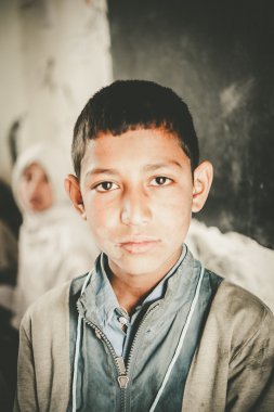 SKARDU, PAKISTAN - APRIL 17: An unidentified Children in a village in the south of Skardu are learning in the classroom of the village school April 17, 2015 in Skardu, Pakistan.