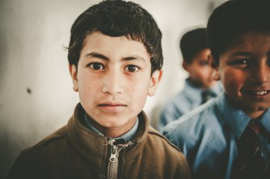 SKARDU, PAKISTAN - APRIL 17: An unidentified Children in a village in the south of Skardu are learning in the classroom of the village school April 17, 2015 in Skardu, Pakistan.