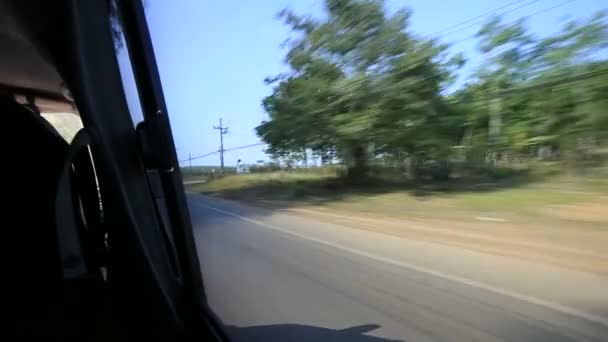 Driving past stone walls and fields — Stock Video