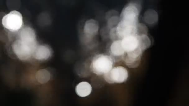 Soft Fokus Bokeh Lichteffekte Über Einem Wasserhintergrund Mit Linsenschlag — Stockvideo