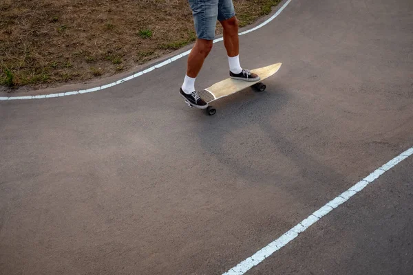 Skateboarder practice on a pump track park