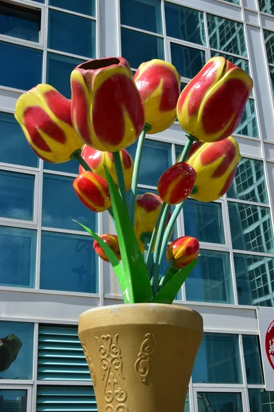 Artificial tulips in a vase — Stock Photo, Image