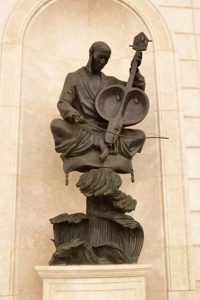 Statue featuring a musician Stock Photo