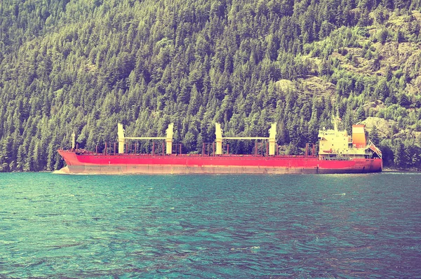 Cargo ship sailing in the fjord. — Stock Photo, Image