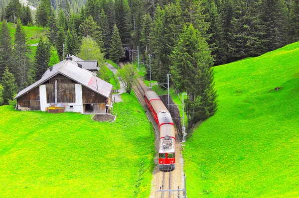 Passenger train moves from Chur to Arosa. — Stock Photo, Image