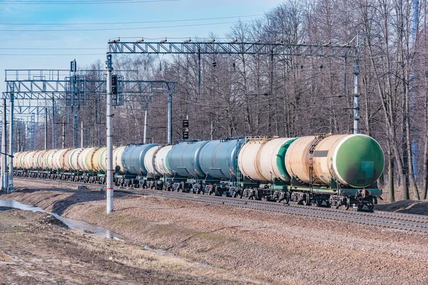 Long Freight Train Approaches Station Royalty Free Stock Images