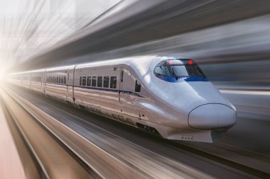 Yolcu hızlı treni sabah saatlerinde hızlı hareket eder. Çin.