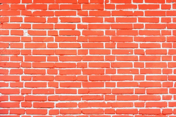赤レンガの壁と石の床の背景 — ストック写真
