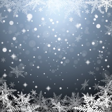 Gri arka plan üzerinde Noel kar taneleri.
