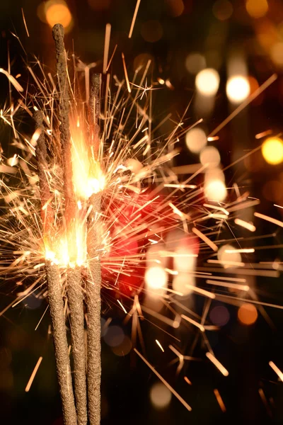 Tres bengalas de Navidad ardientes . — Foto de Stock