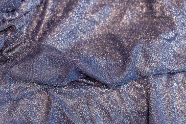 Göz kamaştırıcı bir arka plan. Gümüş renkli parıltı dokusu, Noel tatili, duvar kağıdı dekorasyonu, selamlama ve düğün davetiyesi tasarım unsuru için parlak parlak ambalaj kağıdı arka planı