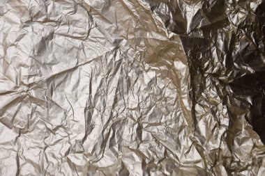 Bronz buruşmuş folyo kağıt dokusu.