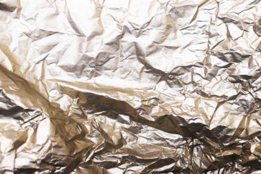 Bronz buruşmuş folyo kağıt dokusu.