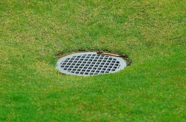 Drain on the golf course — Stock Photo, Image