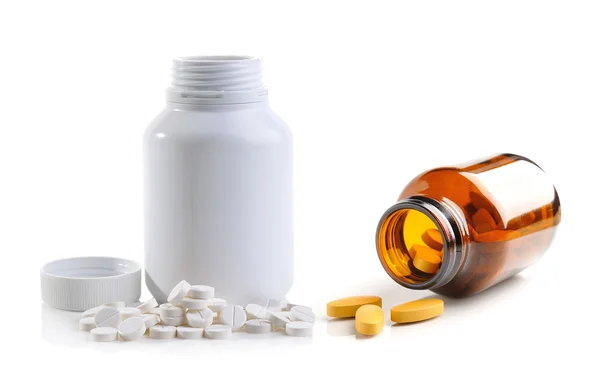 Pills spilling out of pill bottle — Stock Photo, Image