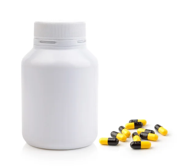 Pills spilling out of pill bottle — Stock Photo, Image