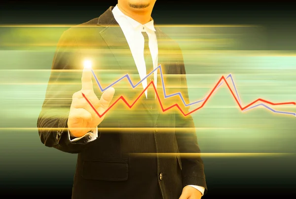 Homem de negócios mão empurrando um gráfico de negócios — Fotografia de Stock