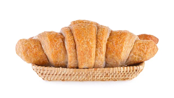 Croissant dans le panier sur fond blanc — Photo