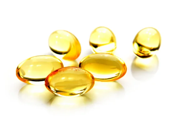 Fish oil pill on white background — Stock Photo, Image