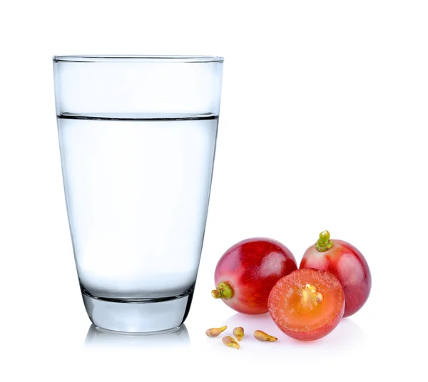 Glass of water and grape on white background — Stock Photo, Image