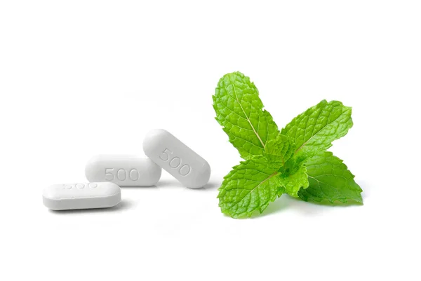 Pill and mint isolated on white background — Stock Photo, Image