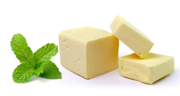 Mint and Stick of butter isolated on white background — Stock Photo, Image