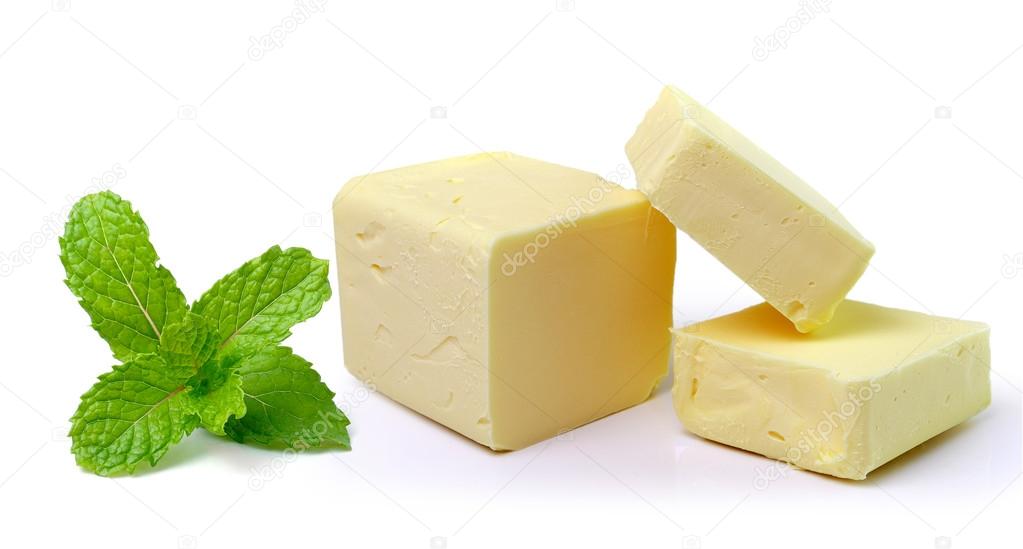 mint and Stick of butter isolated on white background
