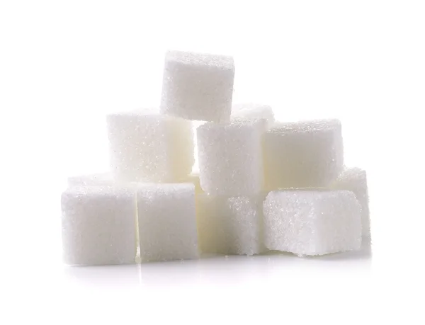 Cubo de açúcar no fundo branco — Fotografia de Stock