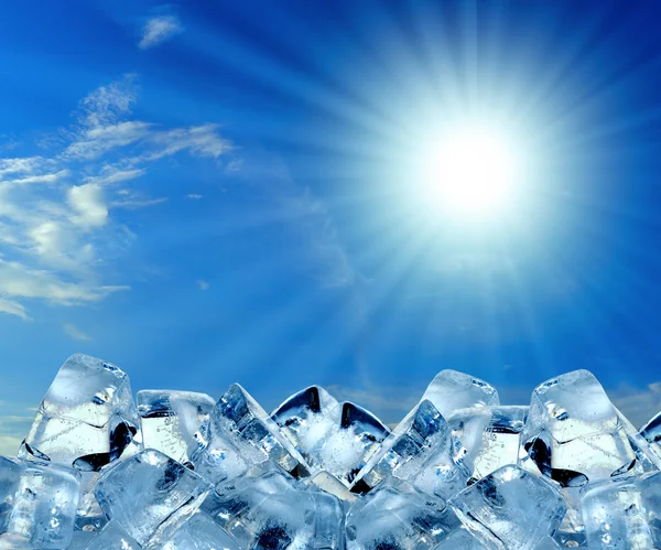 Ice cubes in blue sky — Stock Photo, Image