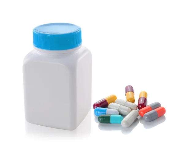 Pillole di bottiglia su sfondo bianco — Foto Stock