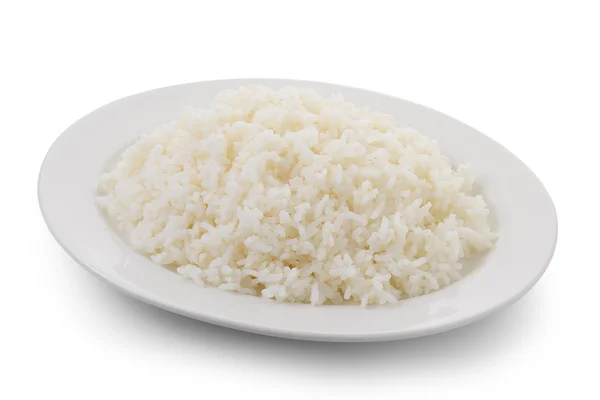 Μαγειρεμένο ρύζι σε λευκή πινακίδα σε άσπρο φόντο — Φωτογραφία Αρχείου
